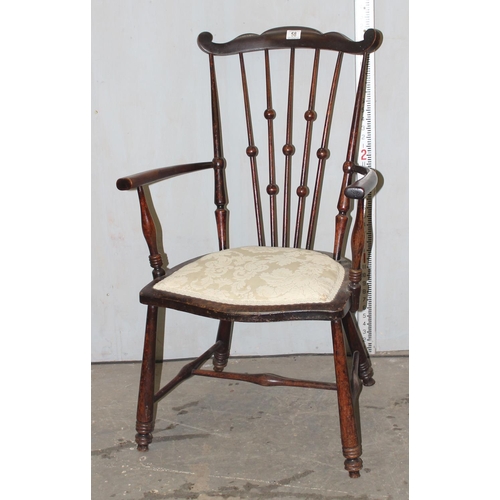 58 - Antique bobbin arm chair