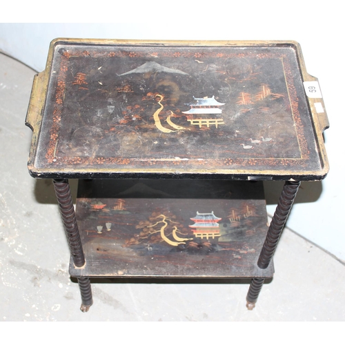 59 - An Oriental black lacquer wine table and a 2 tier tray stand or trolley (2)