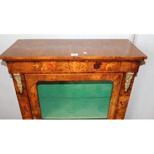 75 - An antique marquetry inlaid pier cabinet with gilt metal mounts and key, 19th century