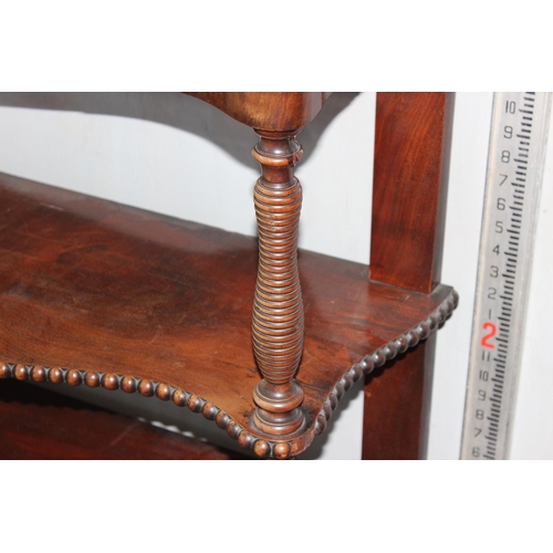 81 - A Victorian Mahogany 4 tier whatnot or buffet stand with turned supports and beaded edges