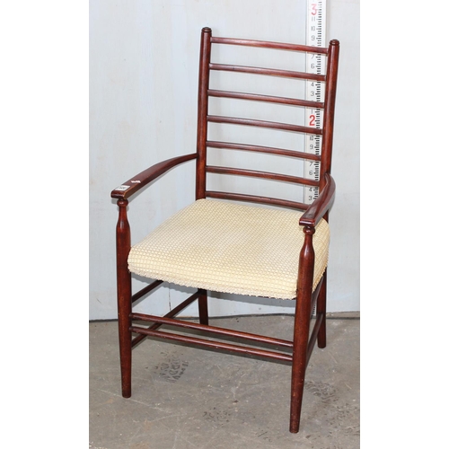 82 - An Arts & Crafts period ladderback armchair in the manner of Liberty & Co