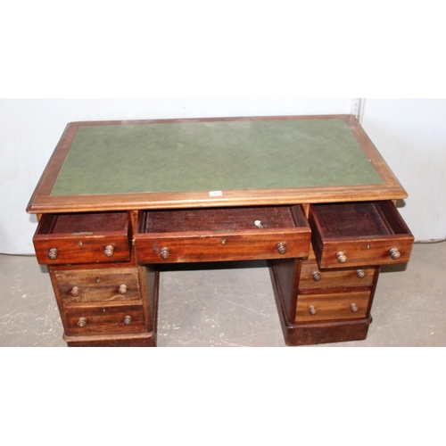 89 - An early 20th century mahogany 3-part desk with green leather top