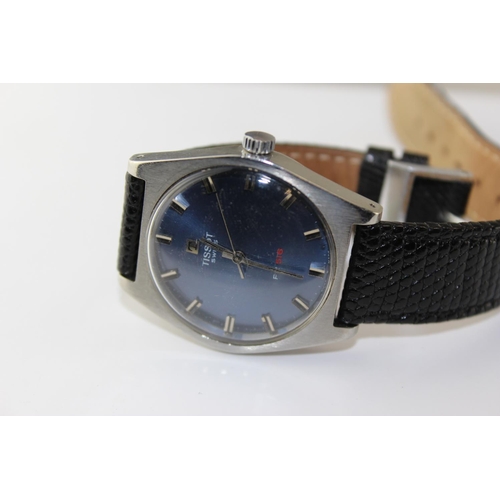 1402 - A vintage Tissot PR516 manual wind wristwatch with blue dial, replacement leather strap