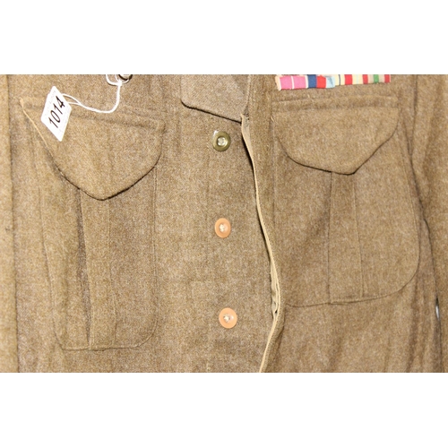 1008 - A WW2 period Coldstream Guards battledress named to Major G.D. Chetwode, with original badges