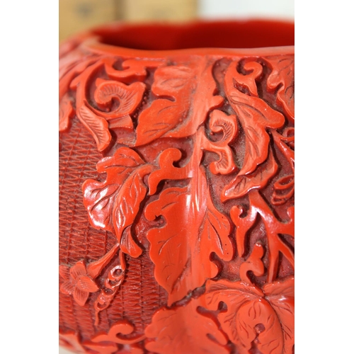 1609 - A Cinnabar lacquer type lidded pot formed as a gourd, on stand, likely 20th century