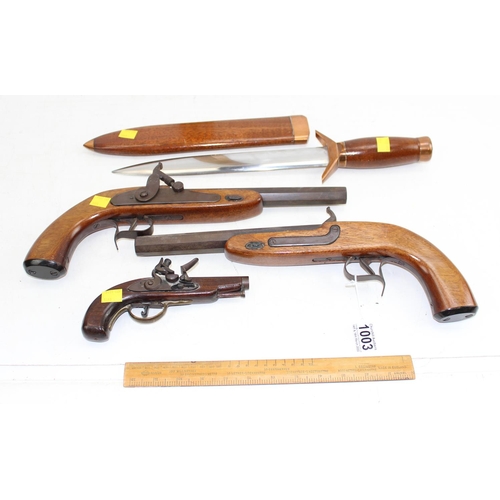 1003 - 3 reproduction flintlock/ percussion cap pistols and a large wooden and brass mounted knife