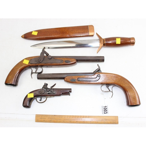 1003 - 3 reproduction flintlock/ percussion cap pistols and a large wooden and brass mounted knife