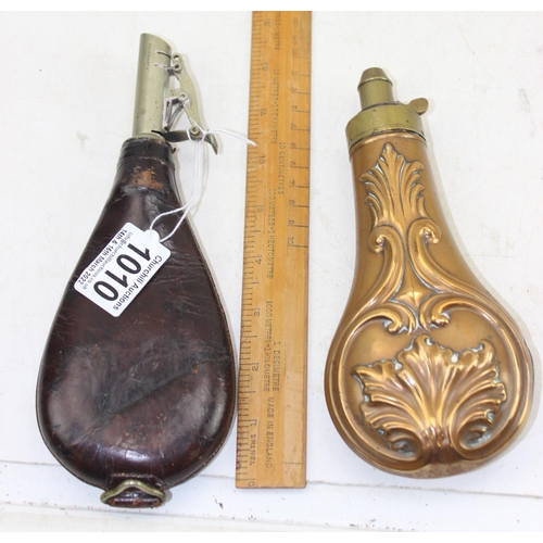 1010 - 2 vintage shot or powder flasks, brass and leather