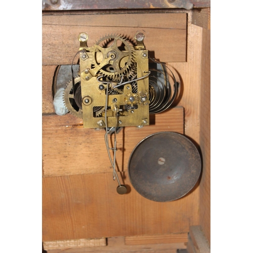 1408 - An early 20th century HAC German made wooden cased mantle clock, with key and pendulum