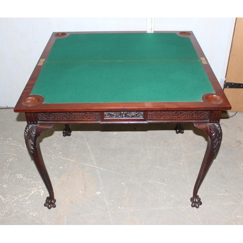 147 - A 19th century mahogany card table by James Shoolbred, Chinoiserie style carved frieze, standing on ... 