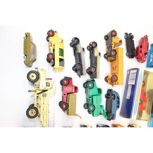 1509 - A large qty of assorted vintage and later Dinky toy vehicles, some boxed,