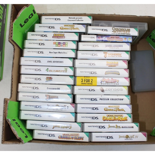 1512 - Qty of assorted Nintendo DS games (right), and empty boxes (left)