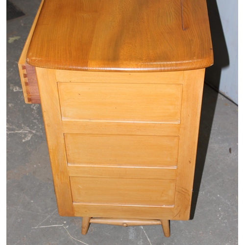 157 - A mid-century Ercol model 351 2 drawer, 3 door sideboard in blonde