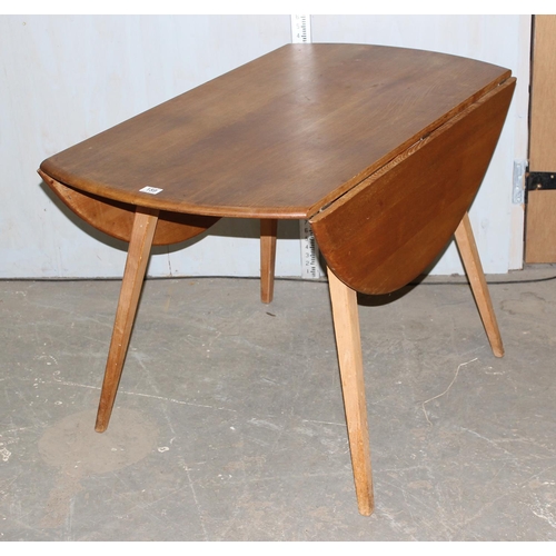 159 - Ercol drop leaf dining table, blue & gold label