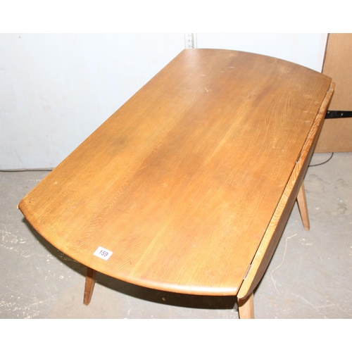 159 - Ercol drop leaf dining table, blue & gold label