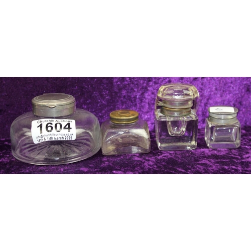 1604 - Qty of assorted antique and vintage glass inkwells and a glass stamp roller (7) - this lot is being ... 