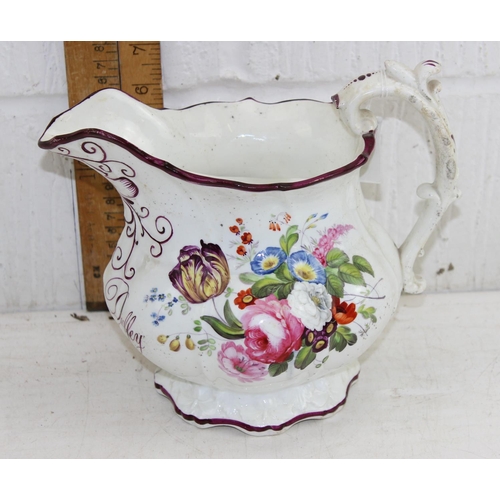 1613 - An early 19th century large porcelain jug decorated with superb quality floral sprays, named Mary Du... 