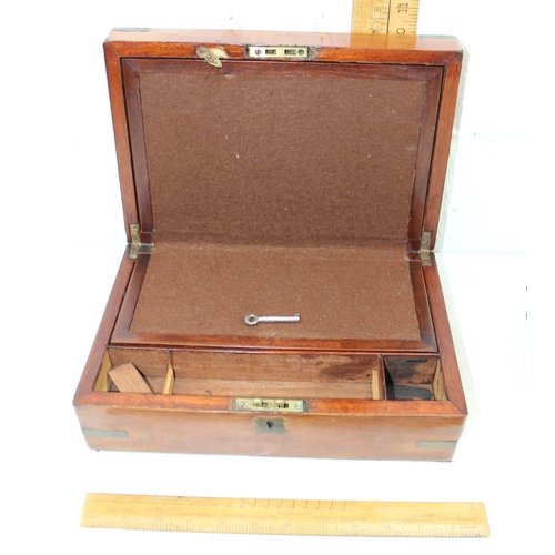 276 - An antique brass bound Mahogany writing slope and a carved oak box named 