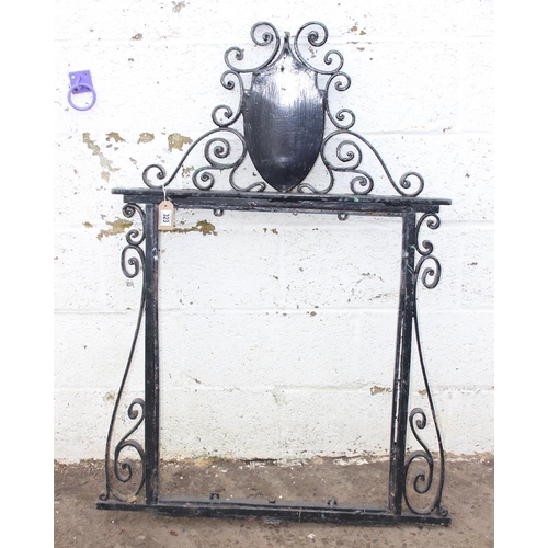 323 - A large wrought iron hanging pub sign bracket, likely early 20th century