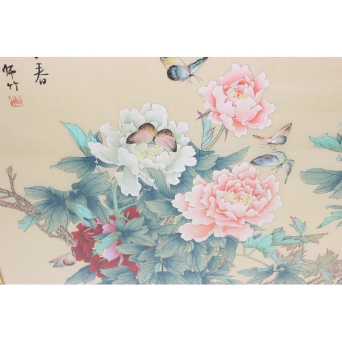 479 - Japanese silk picture depicting butterflies and flowers, signed upper left