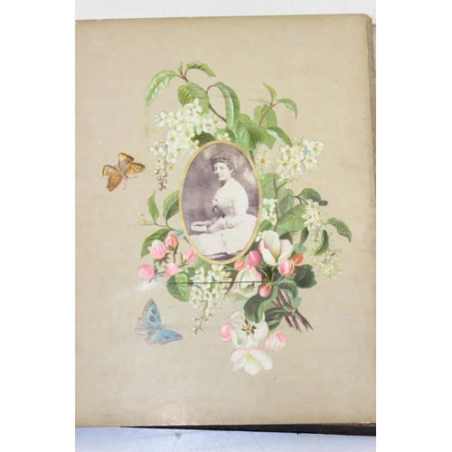 571 - A Victorian leather photograph album and photographs, disbound