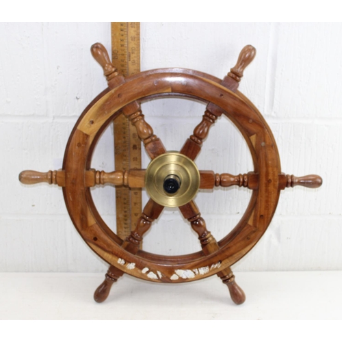 754 - A wooden and brass ship's steering wheel