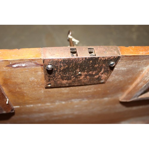 162 - An antique wooden trunk or strong box, with interesting original key, likely 19th century