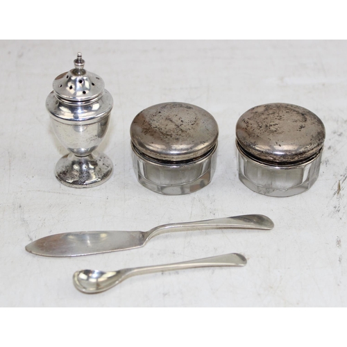 1153 - Silver pepper pot, 2 silver lidded pots, silver butter knife and salt spoon, approx 43.34g gross (wi... 