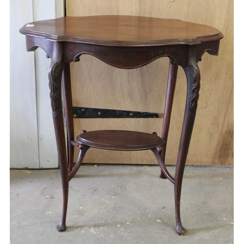 178 - An Edwardian mahogany side table with carved cabriole legs