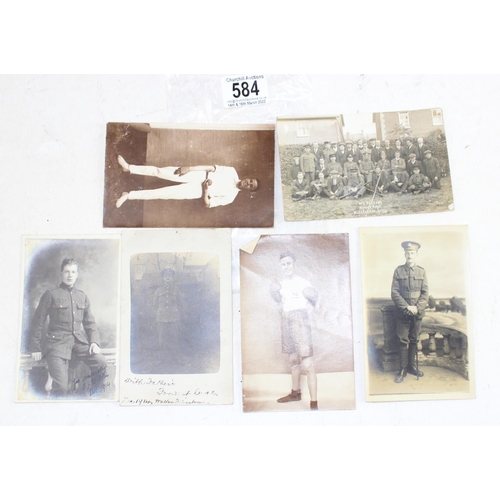 584 - Interesting early 20th century military and sporting related photographs and postcards - This lot is... 