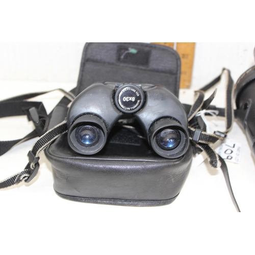 709 - 2 pairs of cased binoculars - This lot is being sold on behalf of the Style Acre charity