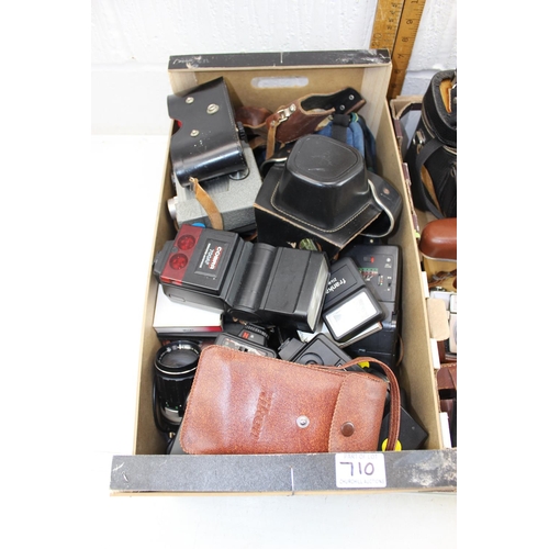 710 - 2 boxes of assorted cameras and camera related accessories etc - This lot is being sold on behalf of... 