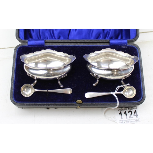 1124 - A pair of large boxed silver salts, Chester 1920 by Barker Brothers with 2 associated silver spoons,... 