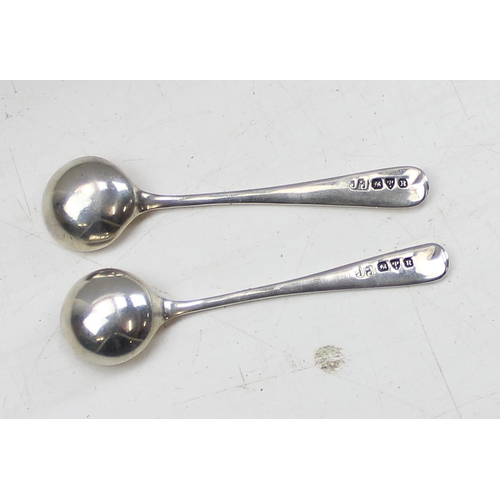 1124 - A pair of large boxed silver salts, Chester 1920 by Barker Brothers with 2 associated silver spoons,... 