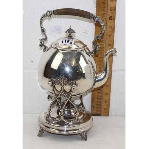 1152 - An antique silver plated spirit kettle on stand