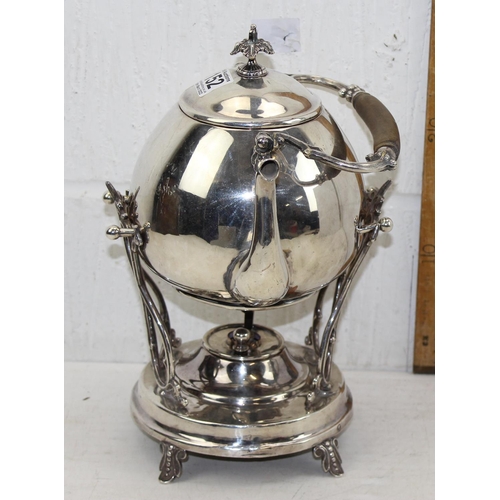 1152 - An antique silver plated spirit kettle on stand