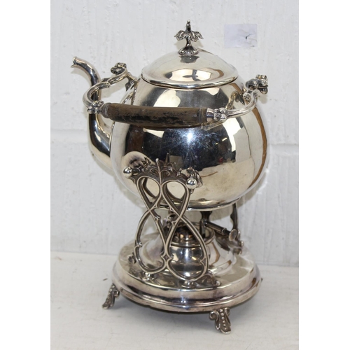 1152 - An antique silver plated spirit kettle on stand