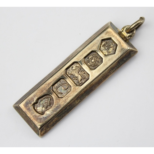 1230 - A silver ingot pendant, Jubilee hallmarks for 1977, approx 30.74g gross - This lot is being sold on ... 