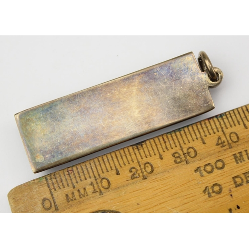 1230 - A silver ingot pendant, Jubilee hallmarks for 1977, approx 30.74g gross - This lot is being sold on ... 