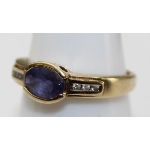 1239 - A 9ct gold diamond & Iolite ring, approx size N, approx 2.71g gross weight, with paperwork