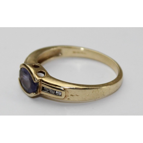 1239 - A 9ct gold diamond & Iolite ring, approx size N, approx 2.71g gross weight, with paperwork