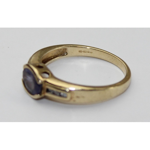 1239 - A 9ct gold diamond & Iolite ring, approx size N, approx 2.71g gross weight, with paperwork