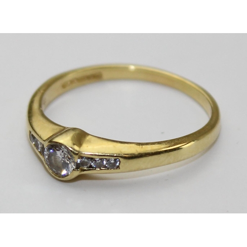 1241 - 18ct gold diamond ring with diamond set shoulders, approx size N, approx 2.42g gross weight,