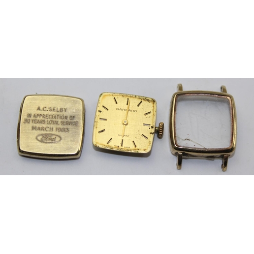 1245 - A 9ct gold cufflink, approx 5.37g gross and a 9ct gold cased Garrard watch, approx 7.71g gross (with... 