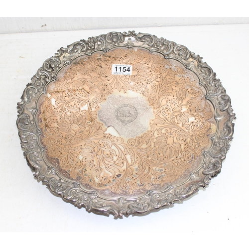 1154 - A 19th century silver plate on copper salver bearing armorial 