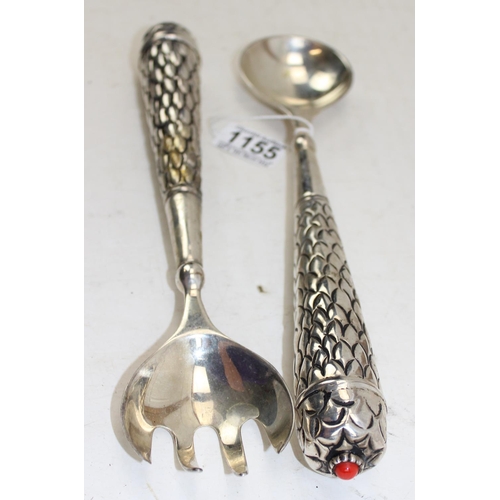 1155 - A pair of white metal salad servers