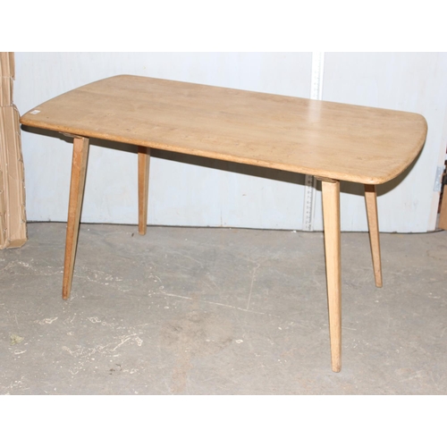 183 - A blonde Ercol model 382 Elm plank dining table