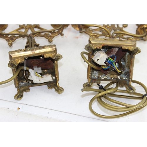 256 - A pair of vintage Rococo style brass table lamps