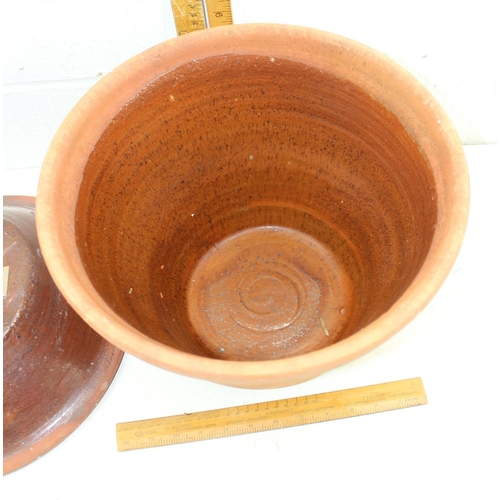 328 - A large vintage terracotta crock pot with lid