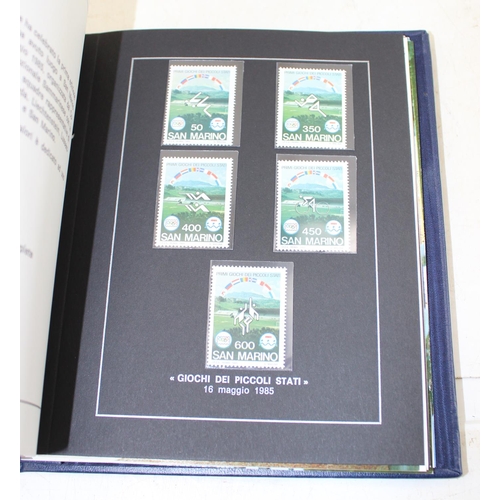 586 - Collection of 22 San Marino 1985 issue mint condition postage stamps in crested leather-bound satin ... 